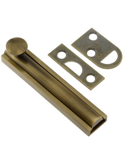 3 inch Contemporary Style Surface Bolt in Antique Brass.